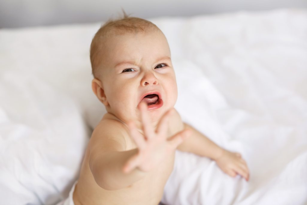 A crying baby girl | Source: Shutterstock