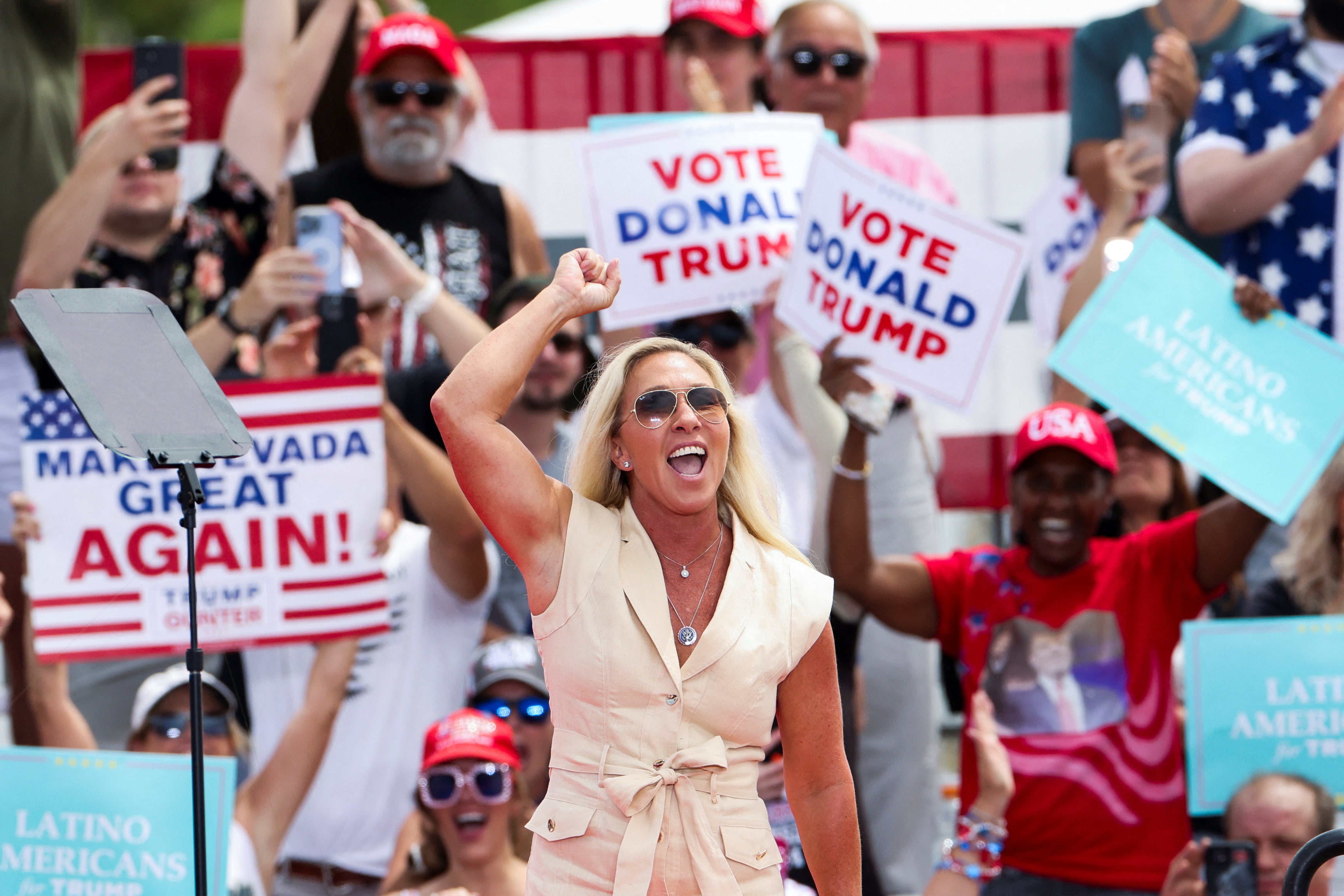 U.S. Rep. Marjorie Taylor Greene (R-GA) gestures as people wait for Republican presidential candidate and former U.S. President Donald Trump to attend a campaign event in Las Vegas, Nevada, U.S., June 9, 2024